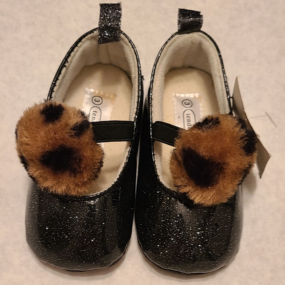 NWT Black sparkly slip on shoes with pom pom detail